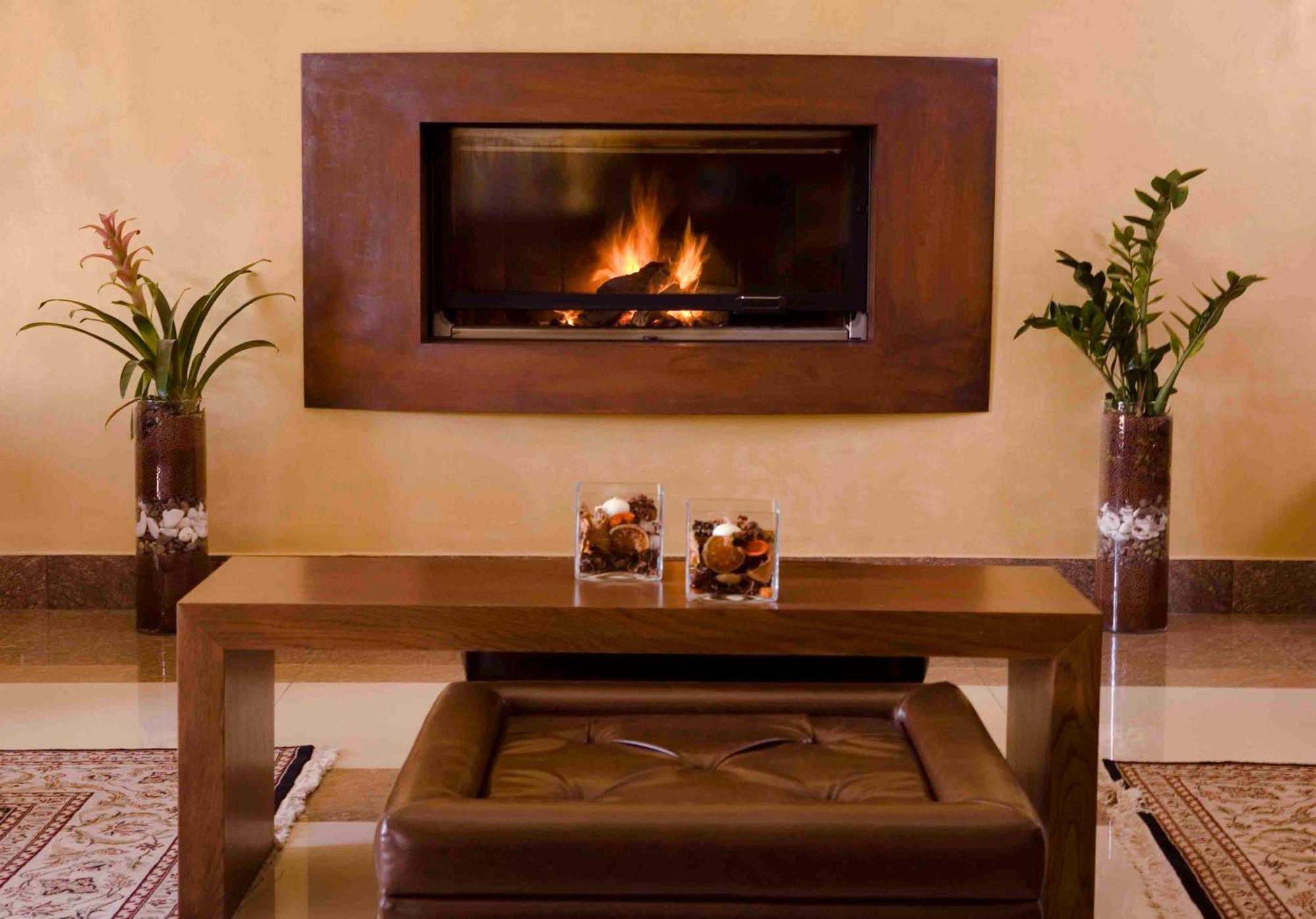 Valis Resort Hotel Volos Bagian luar foto A fireplace