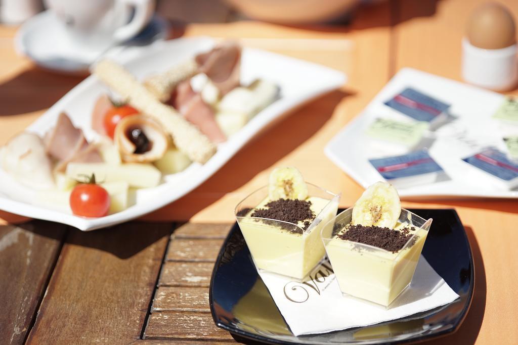 Valis Resort Hotel Volos Bagian luar foto A typical tapas bar menu